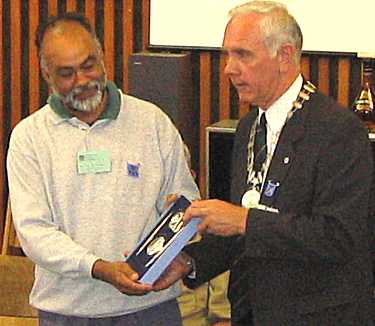 Clive being presented with silverware as a momento of the course, Photo, Jon Cox