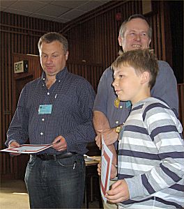 Father and son getting their certificates