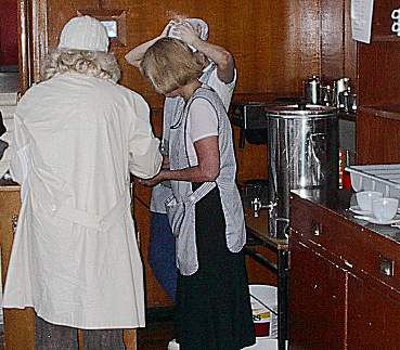 Theresa serving coffee with a laugh and a smile, Photo.... Dave Cushman